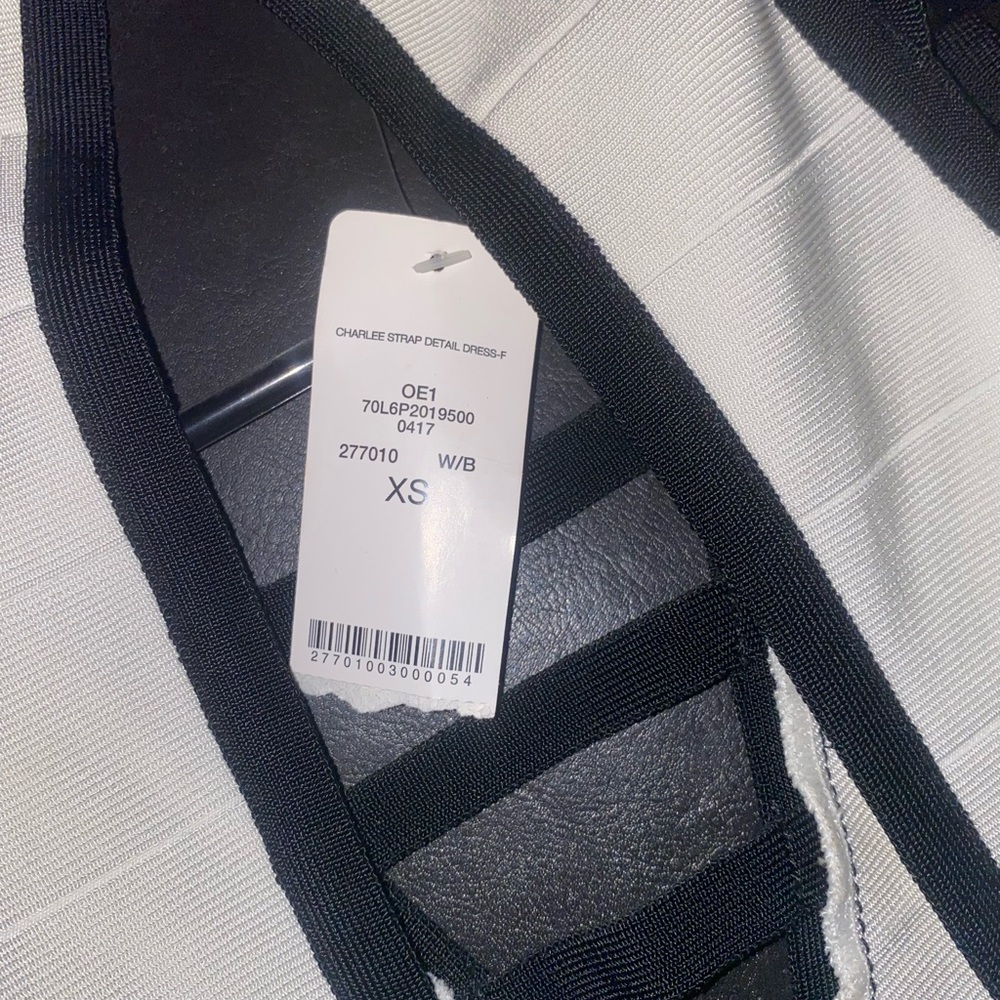 Extra small beautiful and super sexy Bebe dress with tags attached. ❤️ - Picture 4 of 5